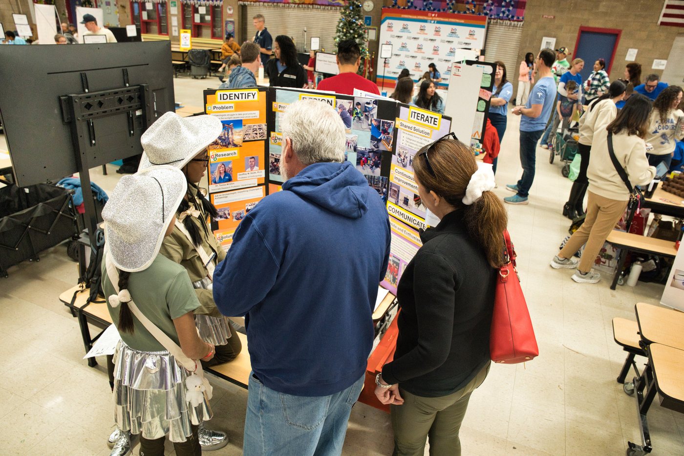 Reno Rovers students presenting project materials to festival reviewers
